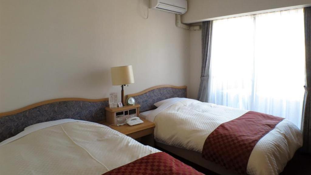 Hotel Tenchikaku Hitachi Bagian luar foto