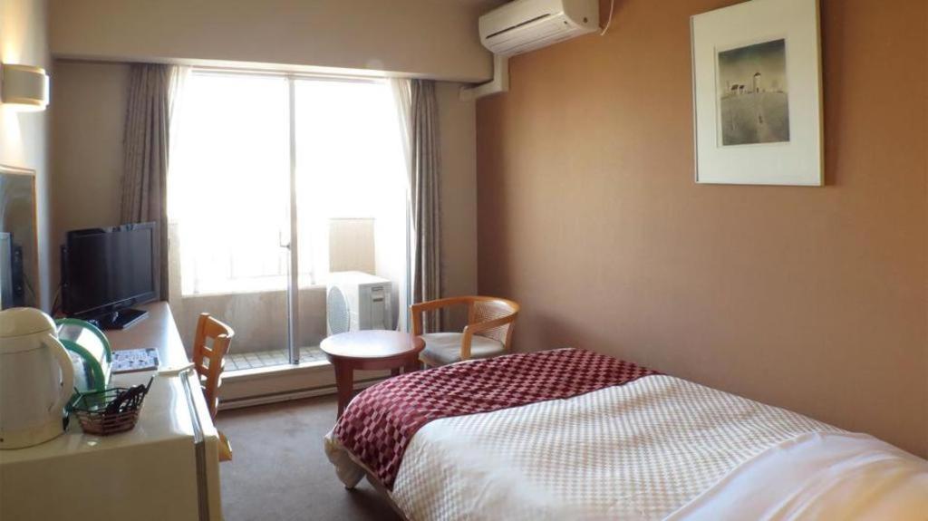 Hotel Tenchikaku Hitachi Bagian luar foto